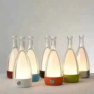 Forma borracha de encargo tricolor moderna multifuncional de la botella de la lámpara de mesita de noche del hotel